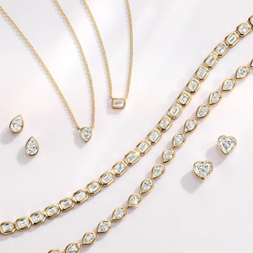 14K Yellow Gold Heart Shaped Lab Diamond Bezel Stud Earrings (7/8 ct. tw.) shape : heart color : F\G clarity : SI1