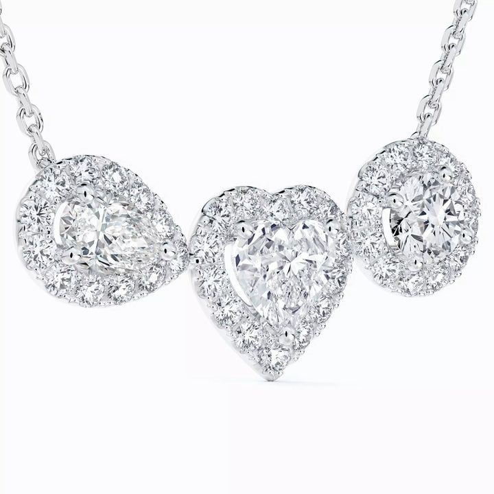 18K white gold Aura Trilogy Pendant color : G+ clarity : VS+
